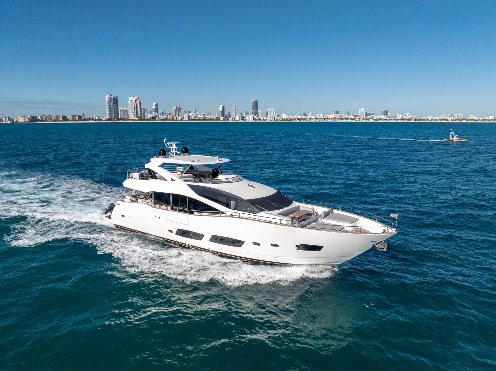 92' Sunseeker yacht anchored off Key Biscayne for a corporate team charter in Miami